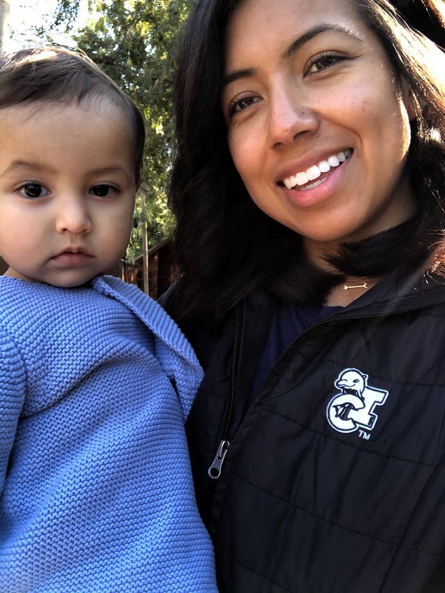 Teacher holding child